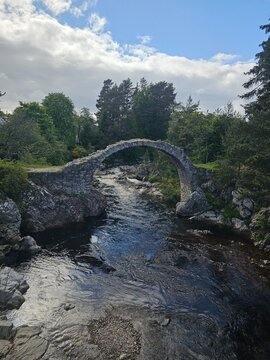 Carrbridge Packhorse Bridge, also known as Coffin Bridge, is a bridge in the village of Carrbridge in the Highlands of Scotland.