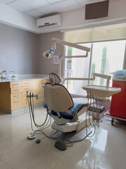 Empty dentist chair in office
