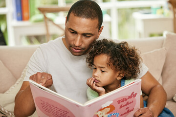 Father, girl child and reading book on sofa for family bonding, learning and development in lounge....