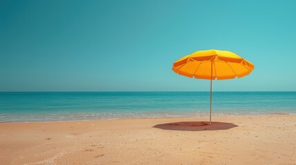 Yellow umbrella on the beach near the ocean, Travel concept