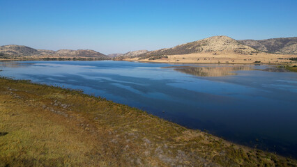 Obraz premium African Lake At Rustenburg In North West South Africa. African Animals Landscape. Pilanesberg National Park. Rustenburg At North West South Africa. Big Five Animals. Wildlife Safari.