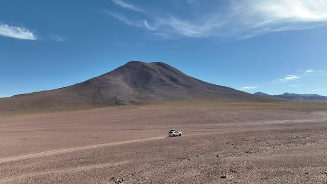 Atacama Desert, Chile. Car on the road. Aerial view by drone.