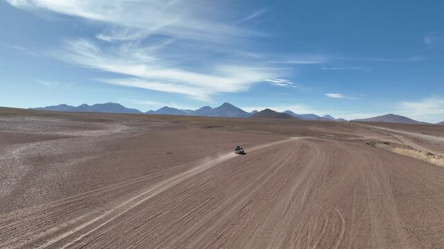 Atacama Desert, Chile. Car on the road. Aerial view by drone.