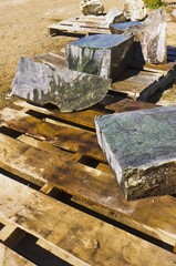 Rough cut jade pieces.
