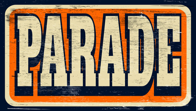 Aged and worn parade sign on wood
