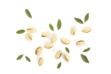 Naklejka premium Tasty pistachio nuts and leaves on white background