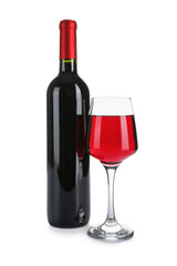Glass and bottle of exquisite wine on white background