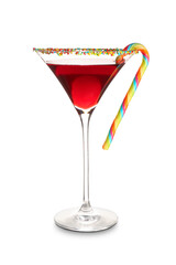 Glass of tasty red margarita with candy cane on white background