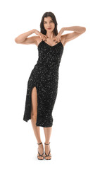 Beautiful young woman in stylish black dress on white background