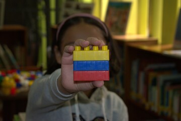 toy, block, brick, cube, construction, building, play, colorful, build, color, game, plastic, child, blocks, wooden, yellow, childhood, hand, shape, blue, green, 3d, business, design, object,flag, col
