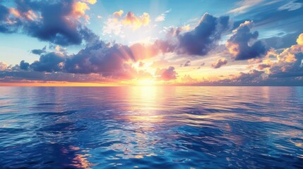 Fototapeta premium The sun is setting over the ocean, casting a warm glow on the water