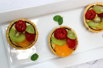 Homemade fresh fruit pie on pkate. Top of view.