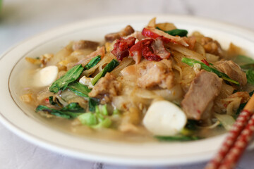 Close up image of kwetiau siram. Delicious chinese indonesia food.