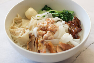 delicious oup kwetiau or kwetiaw kuah .