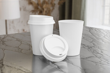Two white take away coffee cup for mockup presentation branding design rendering minimalist blank close up with moody lighting calm and cozy engaging product display or disposable cup concept