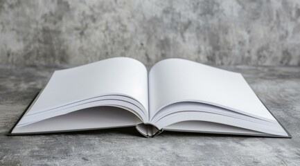 Fototapeta premium An elegant white hardcover book with blank pages lies open, its pristine and minimalist design perfect for conveying purity and simplicity.