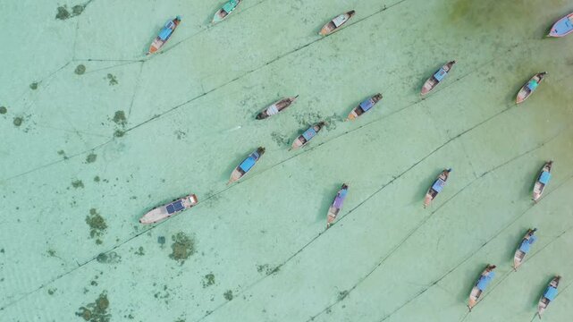 Aerial view of clear blue turquoise seawater, Andaman sea in Phuket island in summer season, Thailand. Water in ocean pattern texture wallpaper background.