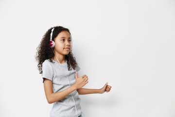 Music beauty kid person children young caucasian portrait childhood earphones girl cute girl background little