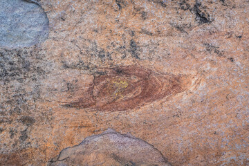 Prehistoric paintings on a cliff in Pha Taem National Park, Ubon Ratchathani, Thailand