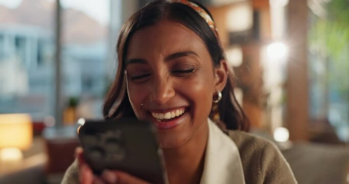 Home, happy woman and using phone on sofa for scroll, swipe and decision on dating website. Indian girl, connection and chat with mobile app, online relationship and yes for profile match on couch