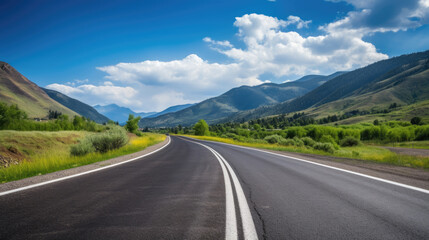 Naklejka premium Two-lane highway spreading out into the distance showing perspective into the american landscape