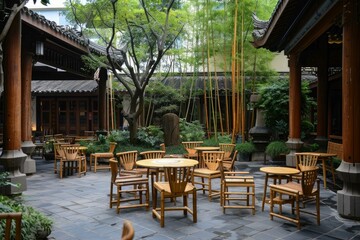 Obraz premium Cozy outdoor seating arrangement in a serene chinese courtyard with classic architecture and greenery