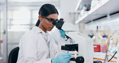 Medical, research and woman with microscope, healthcare and check experiment for cancer treatment. Person, scientist and employee with lab equipment, vaccine and cure development with biochemistry