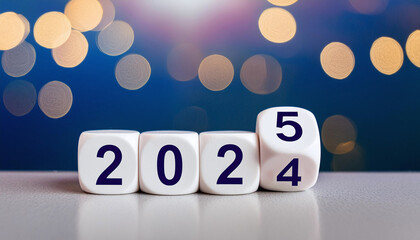 shows four white blocks displaying "2024," with the last block beginning to flip to "2025." The background features a deep blue gradient with soft, warm bokeh lights, creating a festive and celebrator