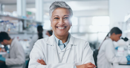 Portrait, scientist and confidence of mature woman in lab for research, career and job as...