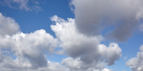 Fototapeta premium Abstract image of blurred sky. Blue sky background with cumulus clouds
