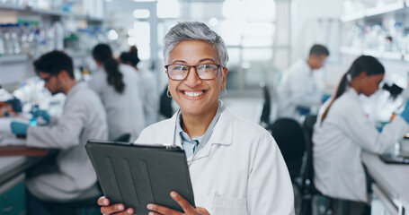Portrait, scientist and happy woman in laboratory with tablet for medical research and job as...