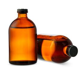 Two Amber Glass Bottles With Liquid On White Background