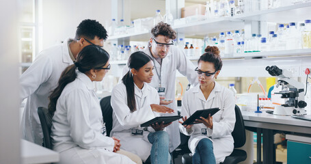 Tablet, science team and people learning for cancer cure, help or medical development in...
