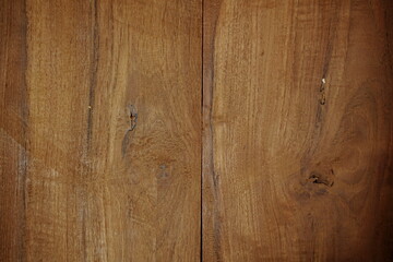 Naklejka premium Dark brown wooden panels texture abstract background