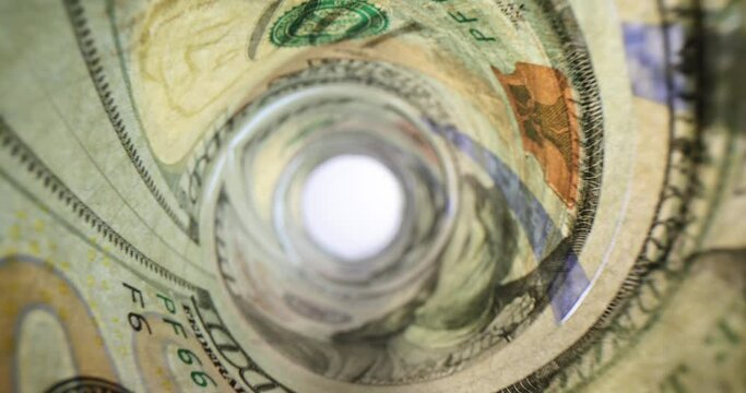 Dollar bills roll with portrait of Benjamin Franklin