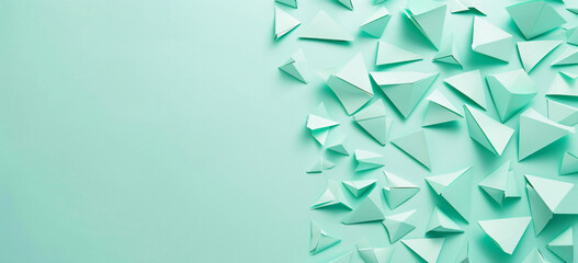 Photo of a minimalist mint green background with geometric shapes for design or text space. Web banner with copy space on the right in the style of minimalism.



