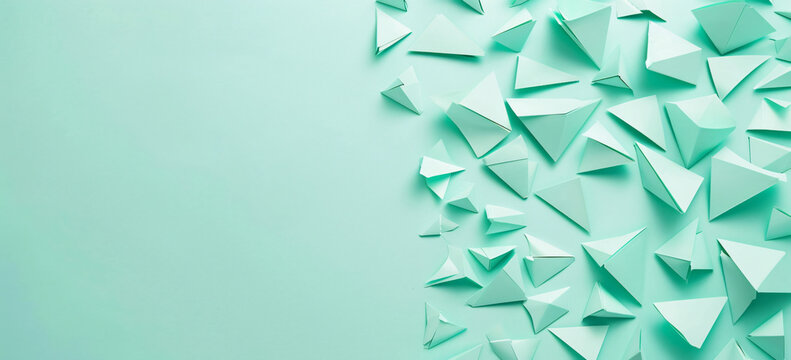 Photo of a minimalist mint green background with geometric shapes for design or text space. Web banner with copy space on the right in the style of minimalism.