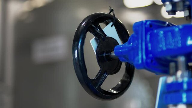 Gate valve used to supply clean water to filtration system closeup. Water treatment plant control systems direct water to filtration tanks