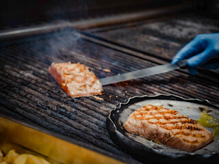 Grilled salmon steak on grill