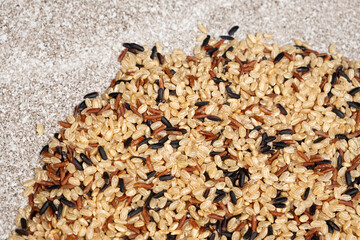 Mix of white, red and black rice, top view, close up