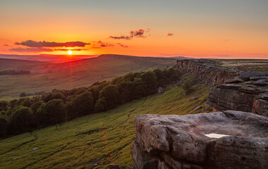Sunset from Stanage Edge in the Hope Valley Peak District National Park Derbyshire East Midlands England