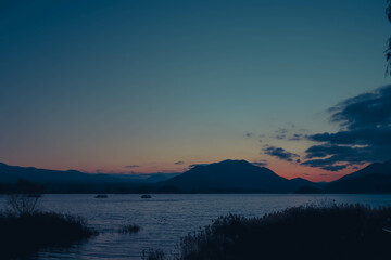 view of lake and mountain in evening