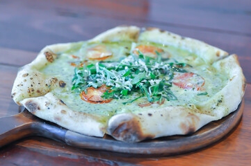 pesto pizza ,pizza with pesto sauce or cheese pizza or vegetarian pizza