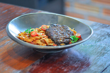 hamburg beef pasta or pasta with tomato sauce , red sauce pasta or red pasta