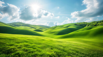 Obraz premium Breathtaking Panoramic Vista of Rolling Green Hills and Bright Sunny Sky