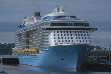 Modern Royal family cruiseships cruise ship ocean liners in port of Seattle, Washington State docked at terminal before Alaska summer cruising on sunny day