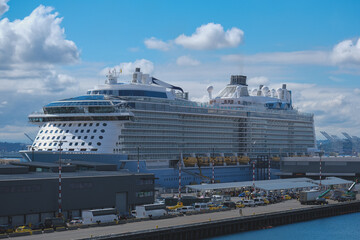 Modern Royal family cruiseships cruise ship ocean liners in port of Seattle, Washington State docked at terminal before Alaska summer cruising on sunny day