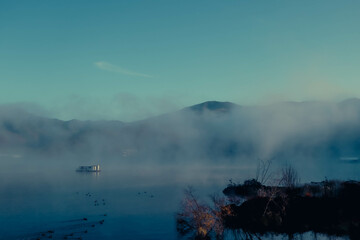 lake in misty morning