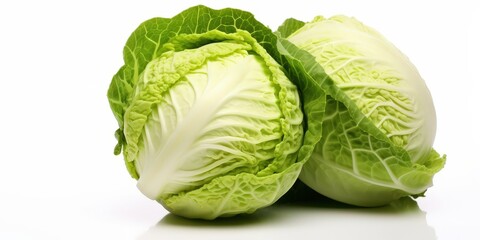Obraz premium Two Fresh Green Cabbages