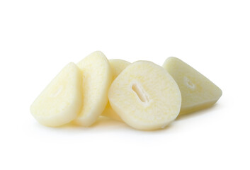 Front view of white garlic slices or pieces in stack isolated on white background with clipping path